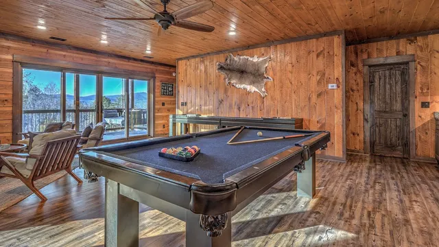 a kitchen with granite countertop a sink and cabinets