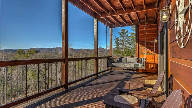 a view of a balcony with wooden floor