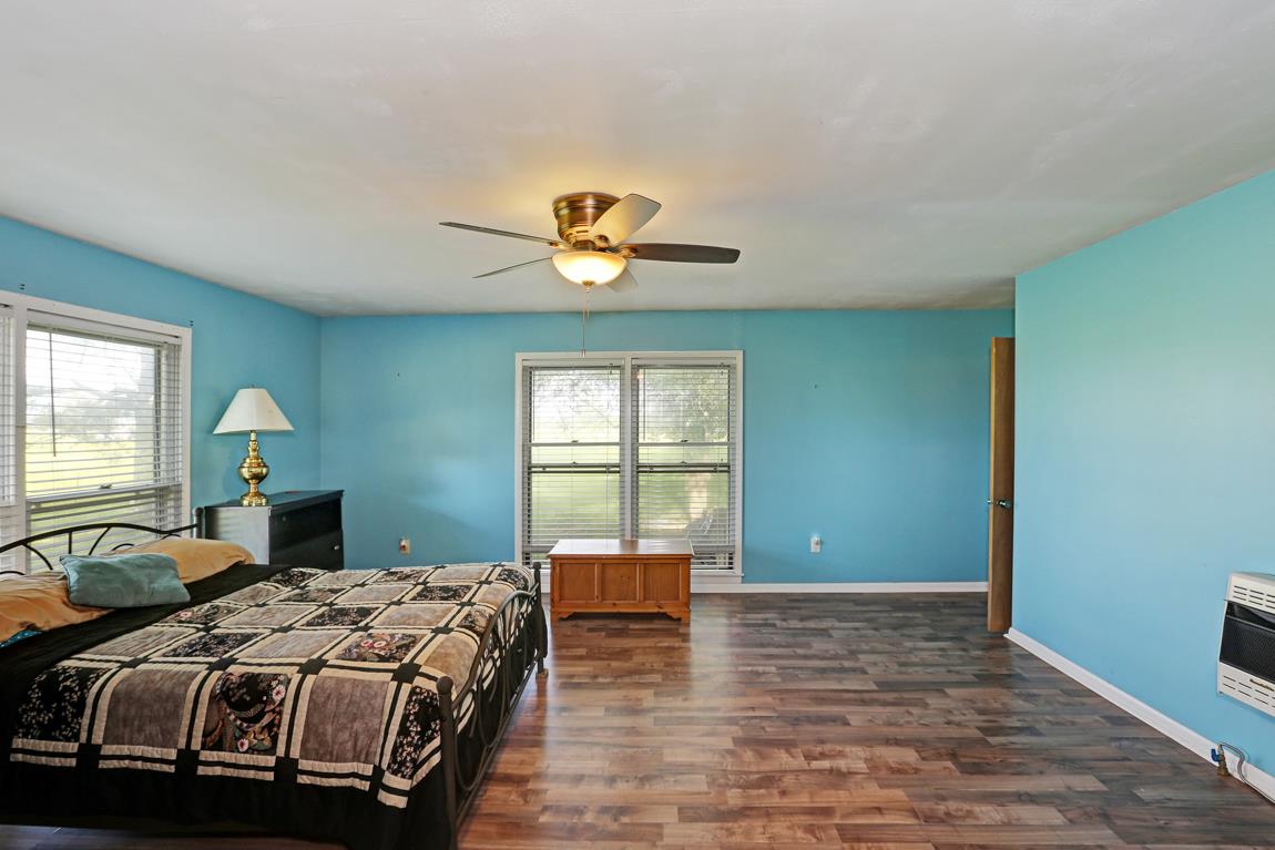 52 Power Station Road Taft, TN 38488 - Photo 17 of 30 a bedroom with a large bed and a window