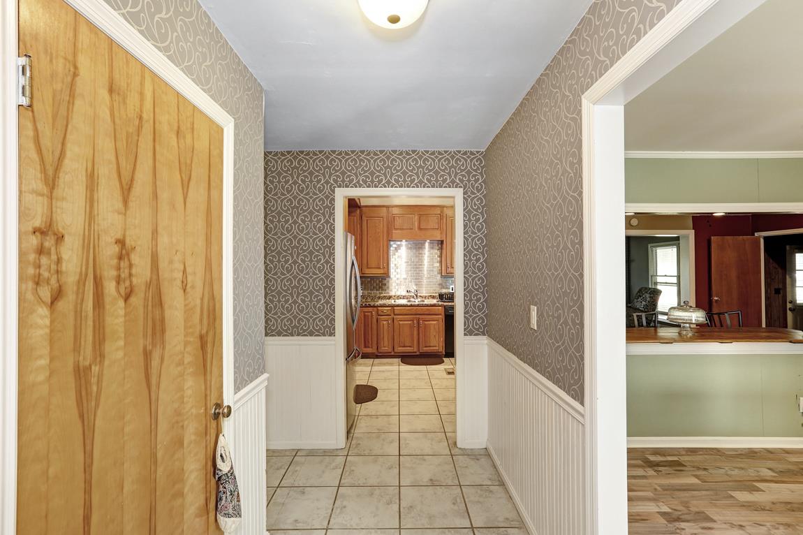 52 Power Station Road Taft, TN 38488 - Photo 18 of 30 a view of a bathroom with tub and door