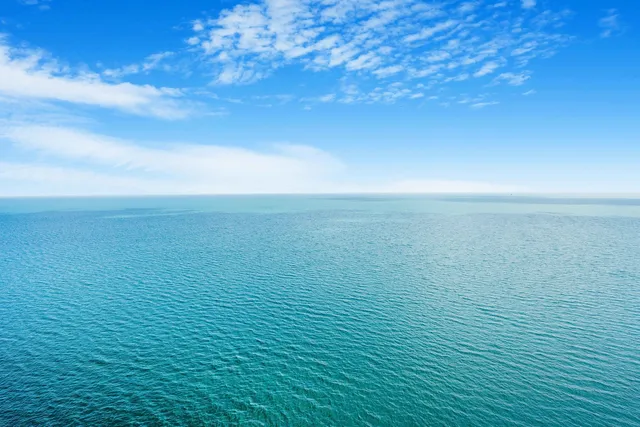 a very nice looking dining room with a table and chairs