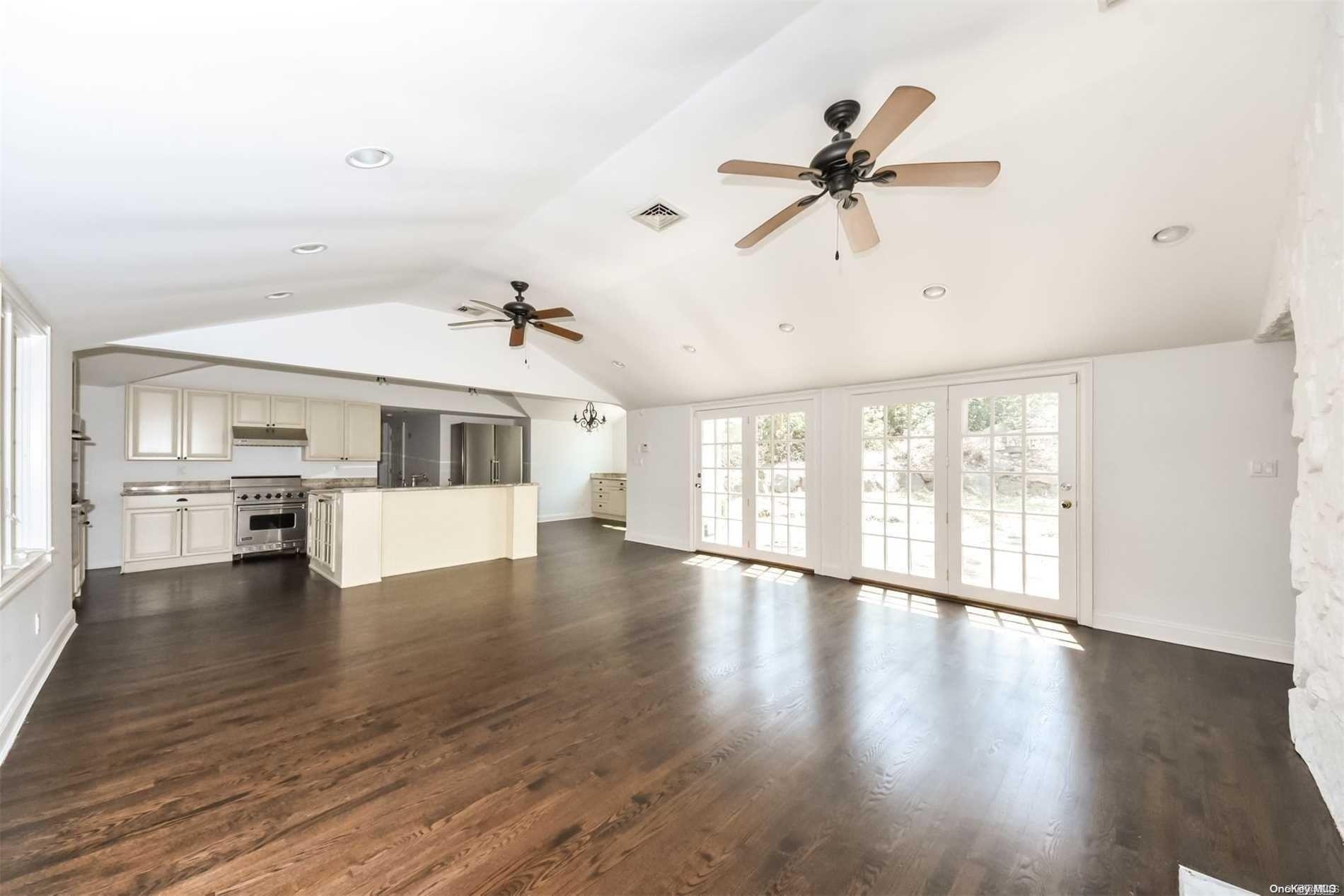 1 Parish Drive Locust Valley, NY 11560 - Photo 6 of 19 a view of an entryway with wooden floor