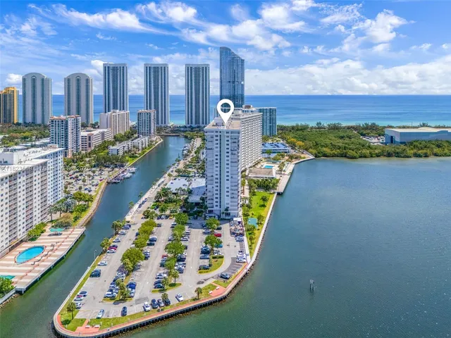 a swimming pool with outdoor seating and yard