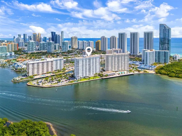 a view of a lake with building in front of it