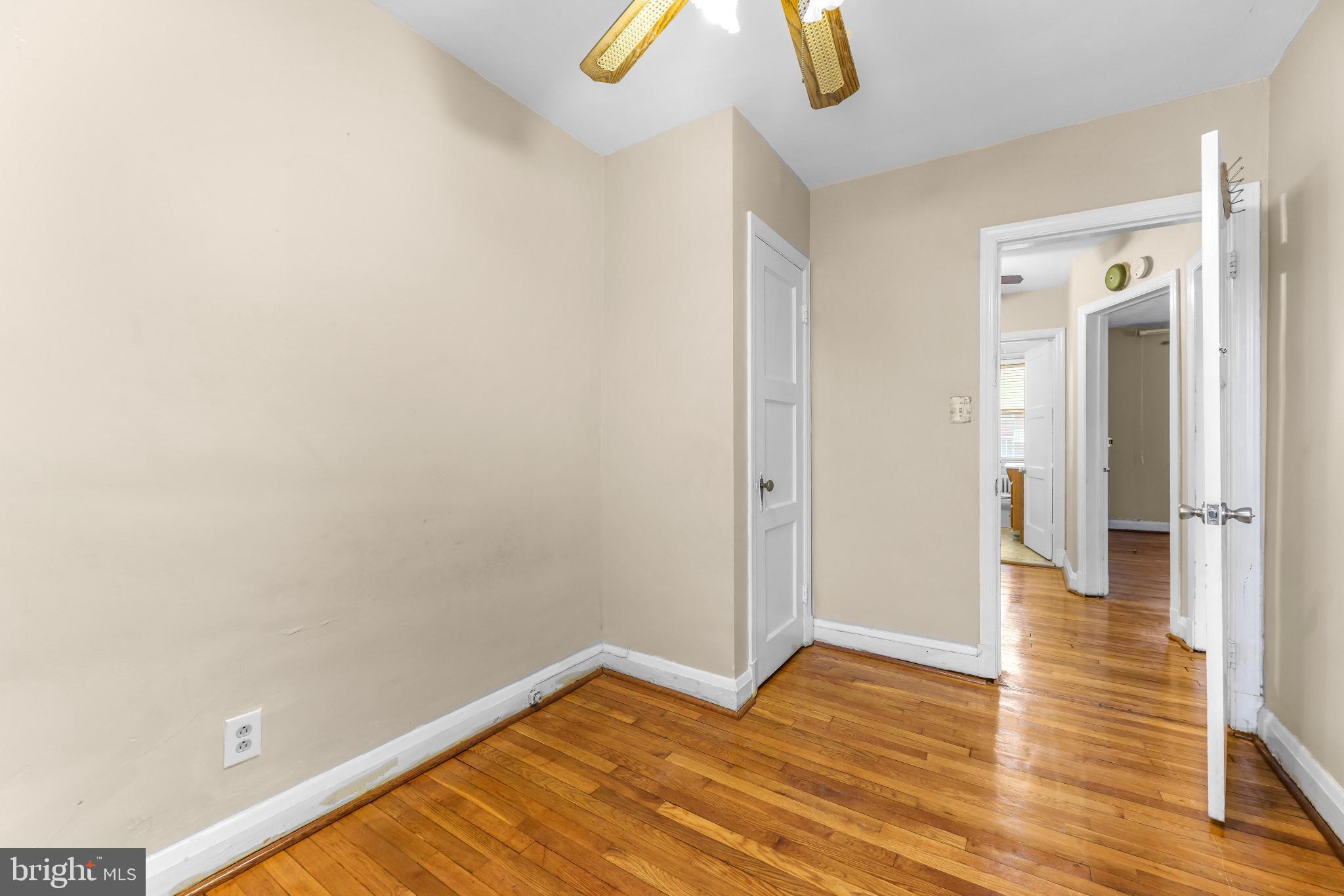 1603 Northgate Road Baltimore, MD 21218 - Photo 17 of 34 Bright and airy space with warm wood floors.