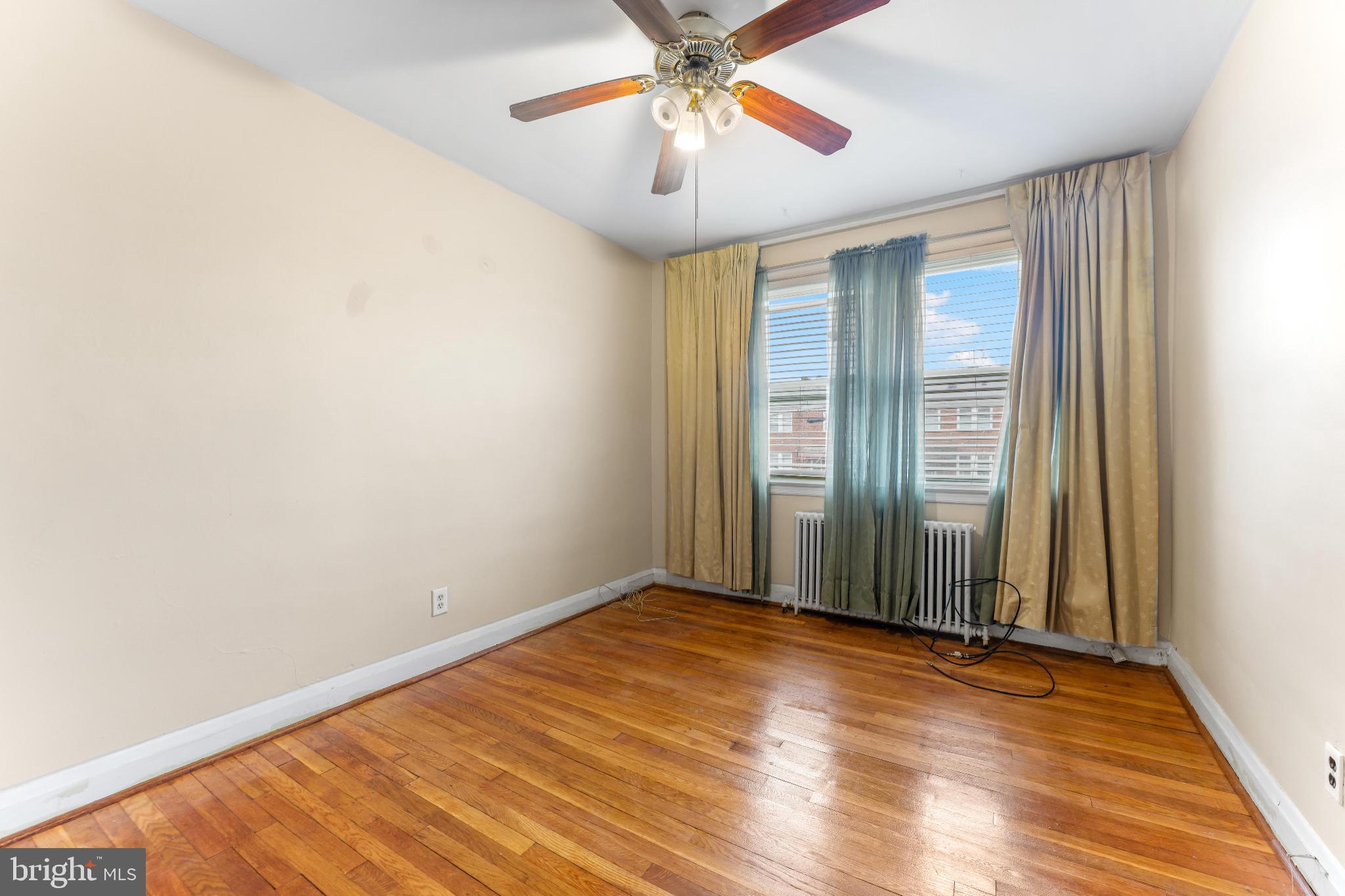 1603 Northgate Road Baltimore, MD 21218 - Photo 18 of 34 Bright and airy room with hardwood floors.