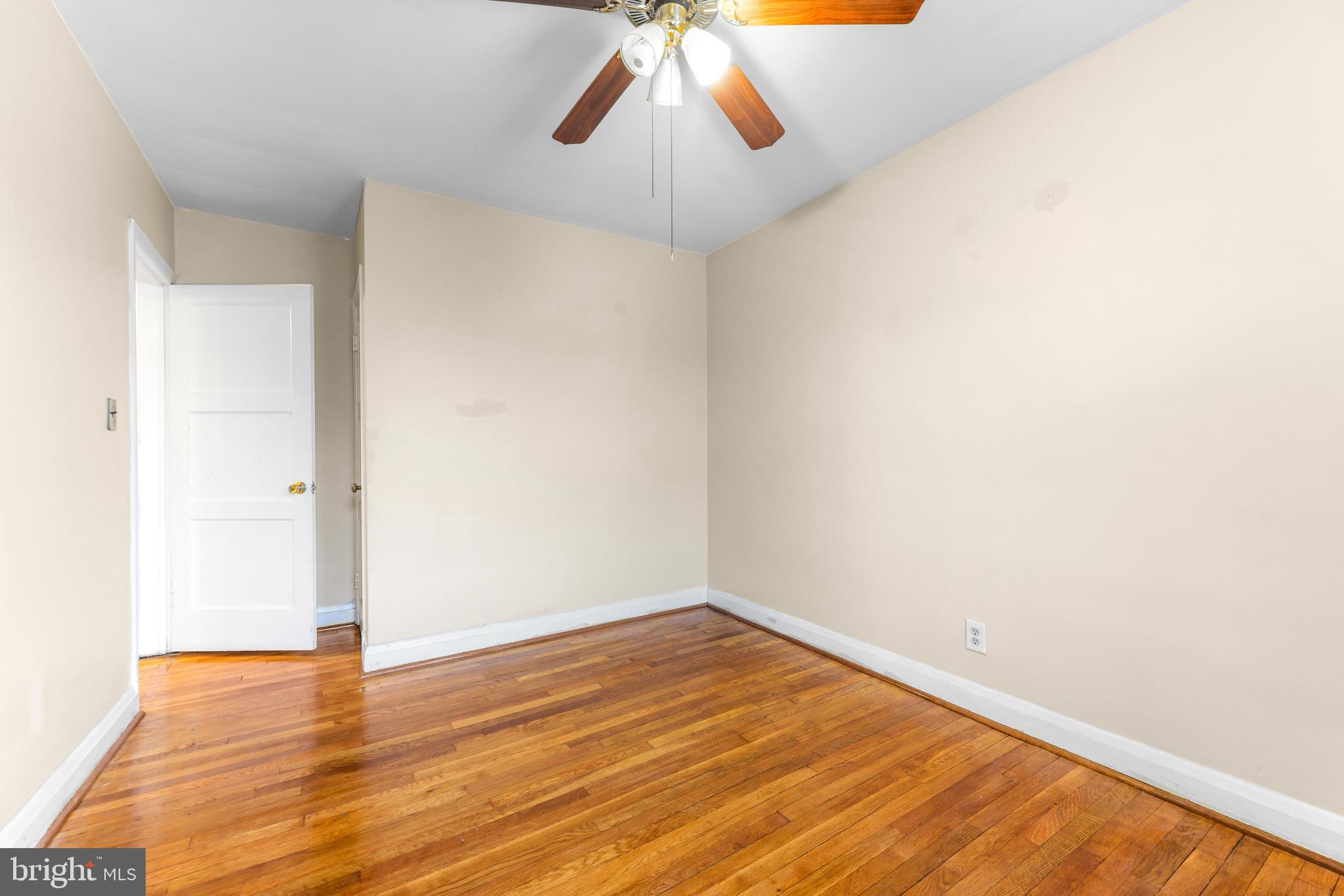 1603 Northgate Road Baltimore, MD 21218 - Photo 19 of 34 Bright and airy room with hardwood floors.