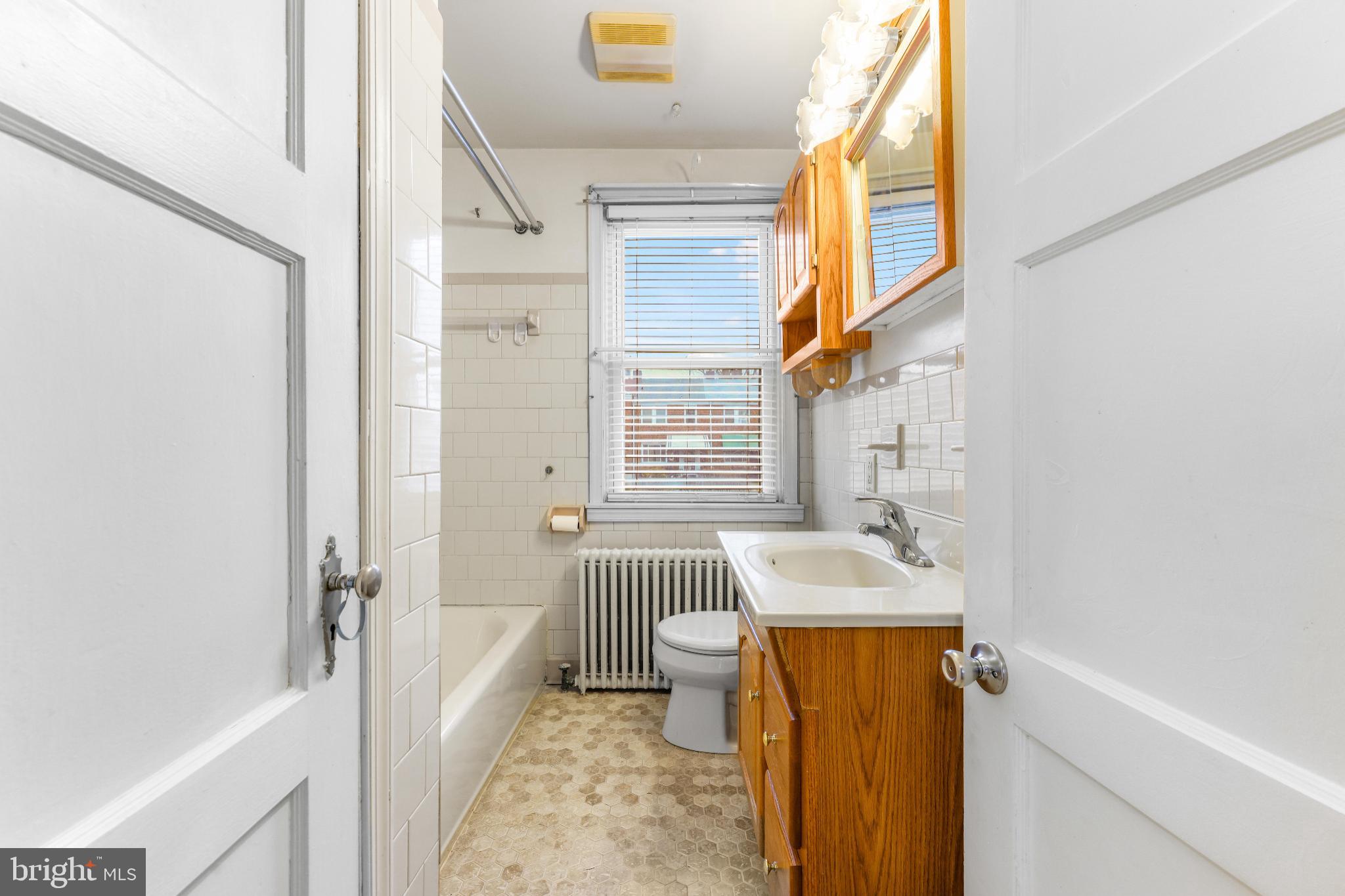 1603 Northgate Road Baltimore, MD 21218 - Photo 20 of 34 Bright and inviting bathroom with classic charm.