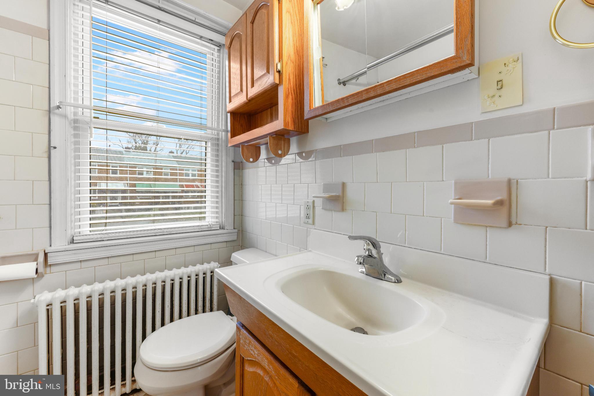 1603 Northgate Road Baltimore, MD 21218 - Photo 21 of 34 Bright and airy bathroom with classic charm.