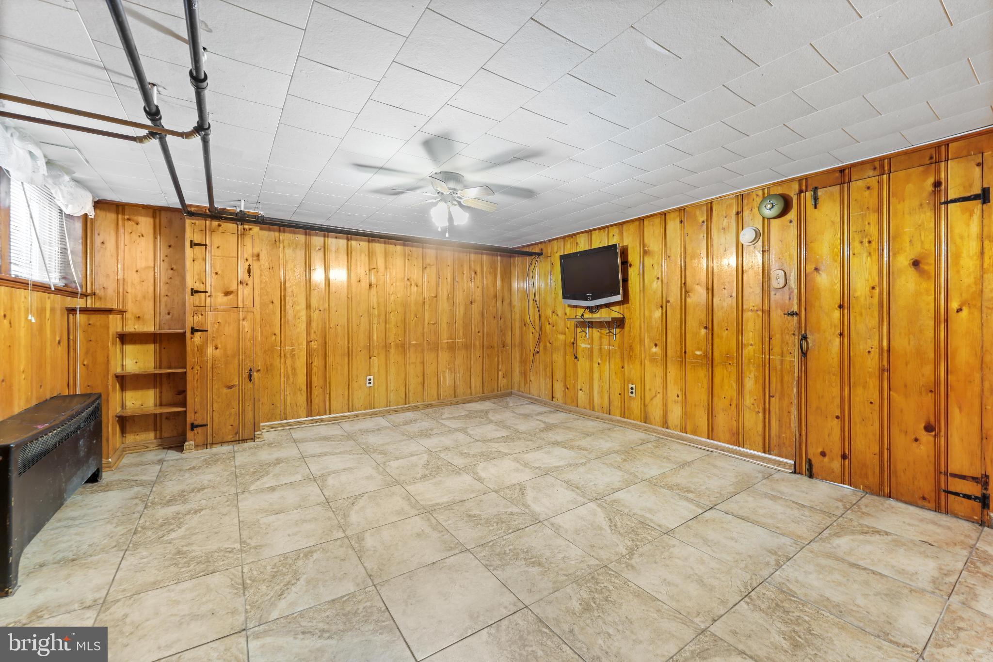 1603 Northgate Road Baltimore, MD 21218 - Photo 23 of 34 Spacious basement with warm wooden accents.