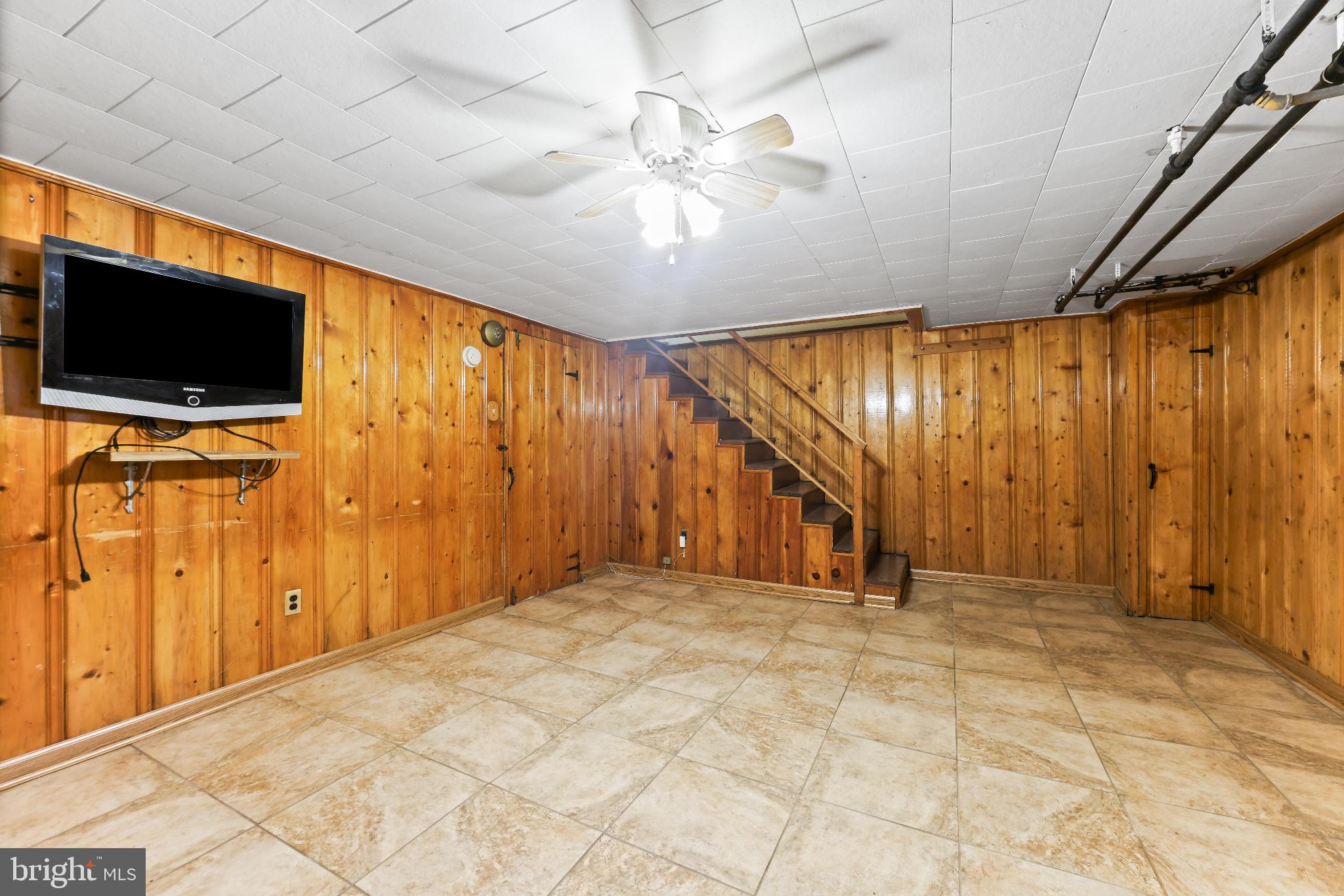 1603 Northgate Road Baltimore, MD 21218 - Photo 24 of 34 Cozy basement retreat with wooden accents.