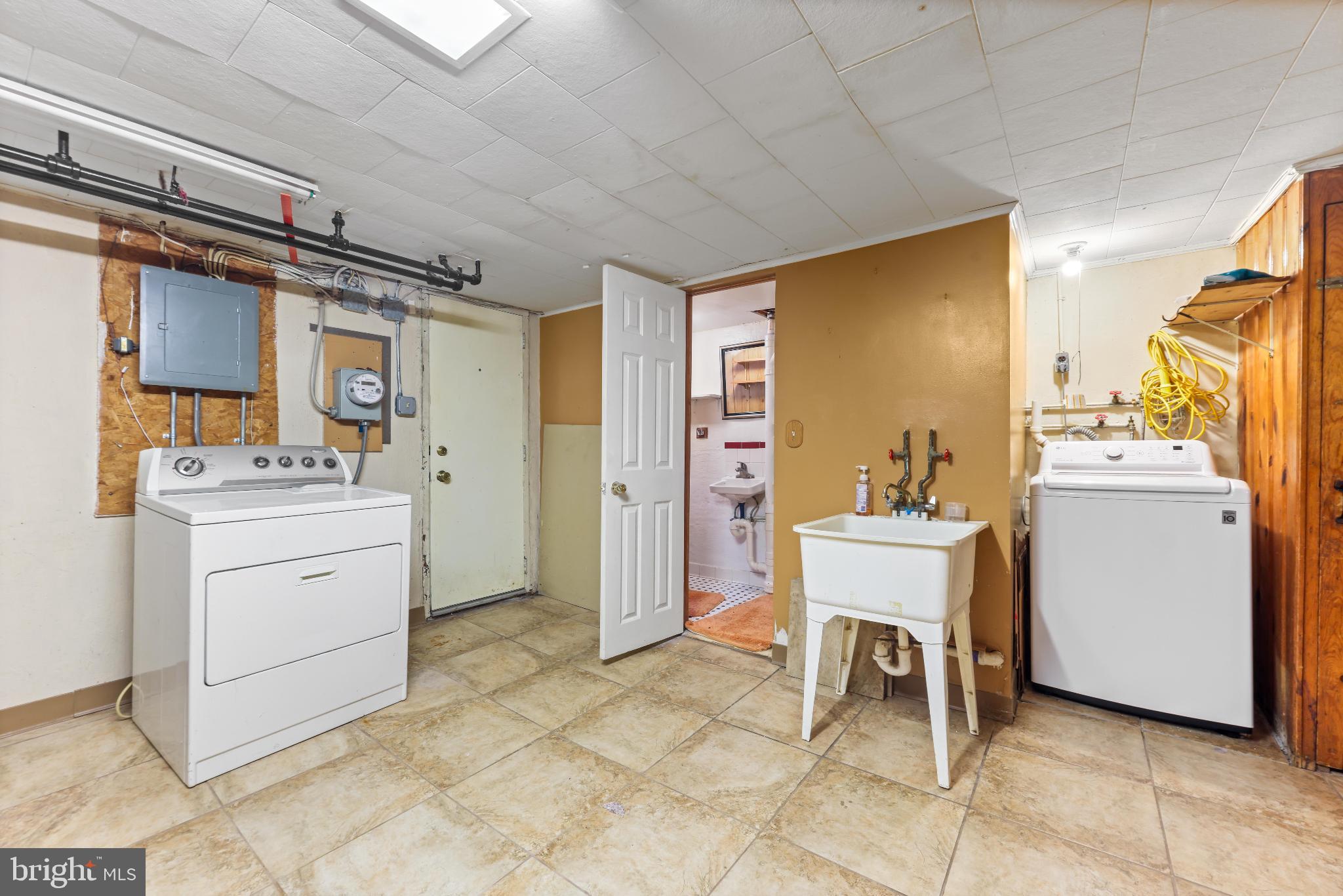 1603 Northgate Road Baltimore, MD 21218 - Photo 25 of 34 Bright and functional laundry space.