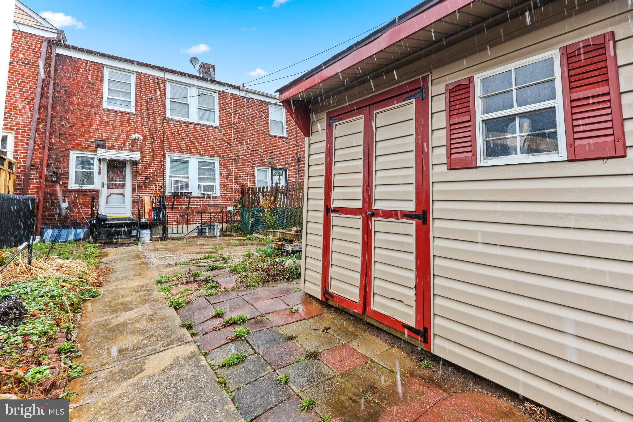 1603 Northgate Road Baltimore, MD 21218 - Photo 28 of 34 Charming backyard with a cozy shed.