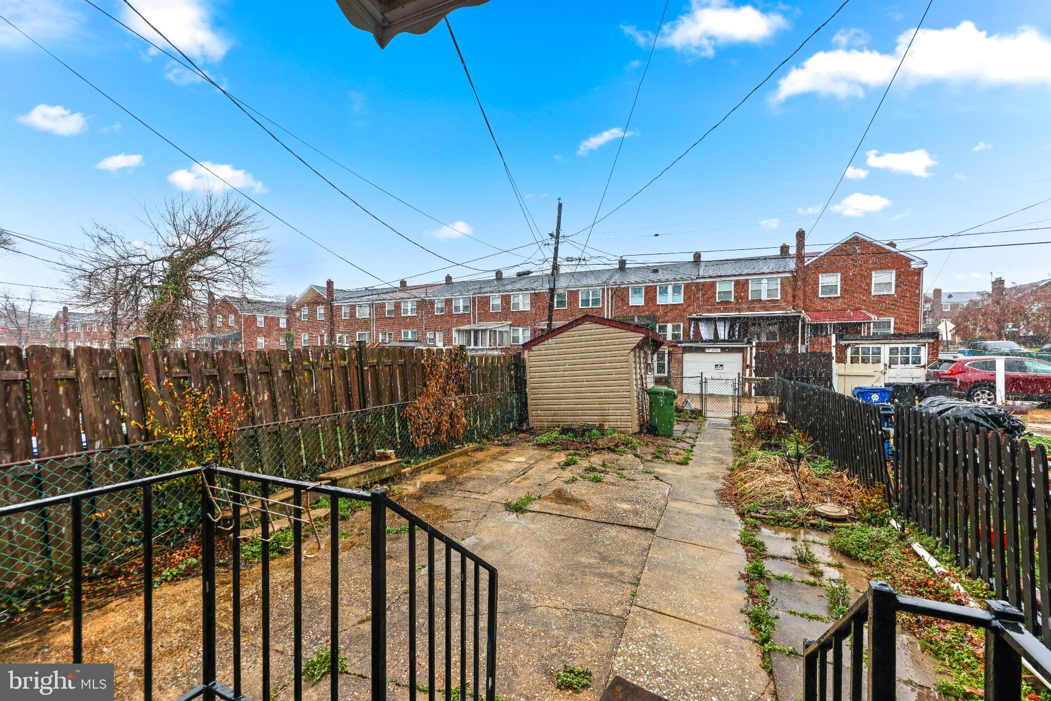1603 Northgate Road Baltimore, MD 21218 - Photo 29 of 34 Spacious backyard with urban charm.