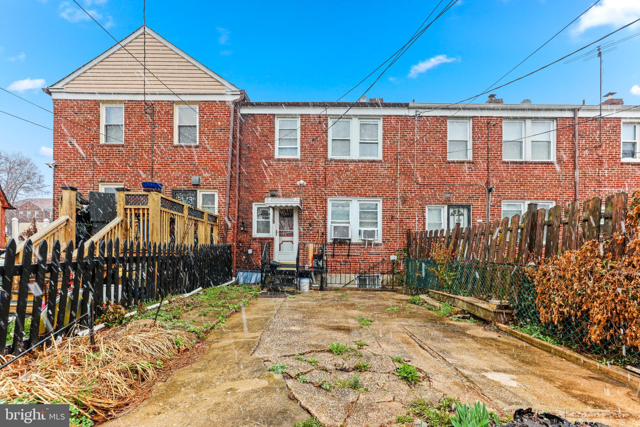 1603 Northgate Road Baltimore, MD 21218 - Photo 30 of 34 Charming brick townhouse with inviting yard.
