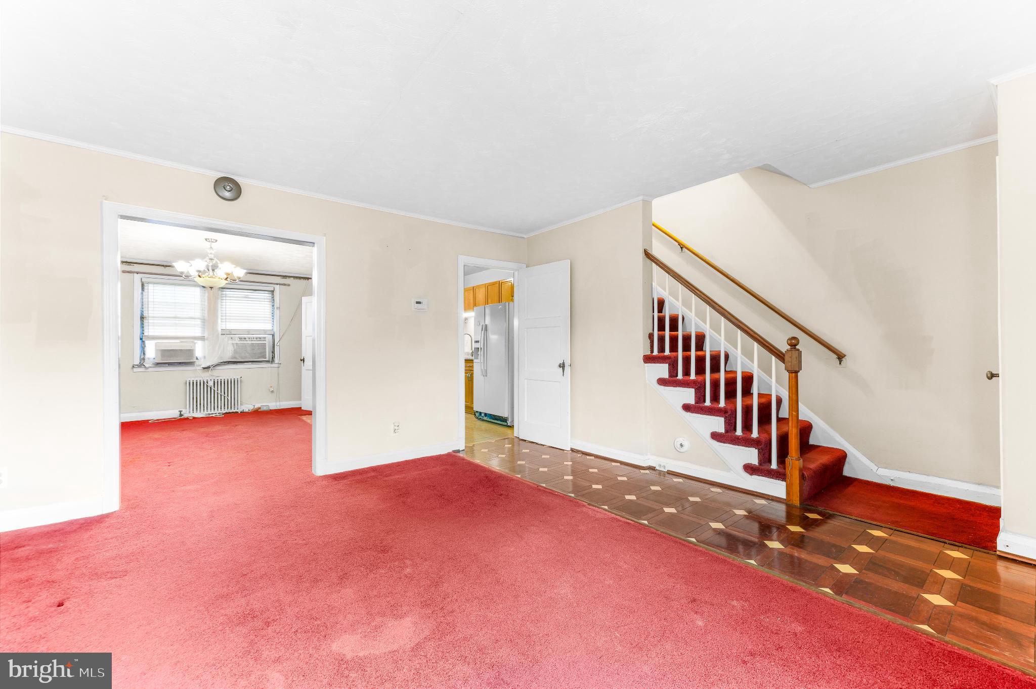 1603 Northgate Road Baltimore, MD 21218 - Photo 4 of 34 Spacious living area with inviting staircase.