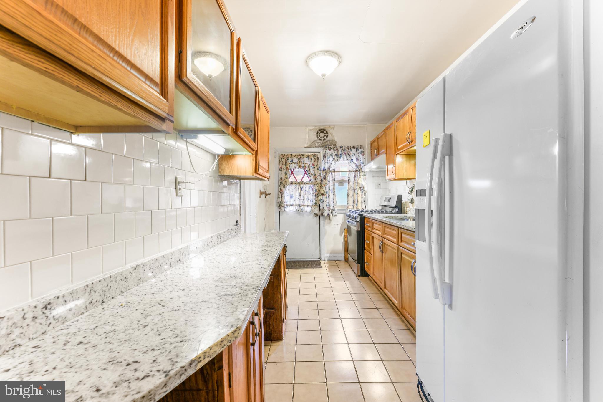 1603 Northgate Road Baltimore, MD 21218 - Photo 9 of 34 Bright and inviting kitchen with modern finishes.