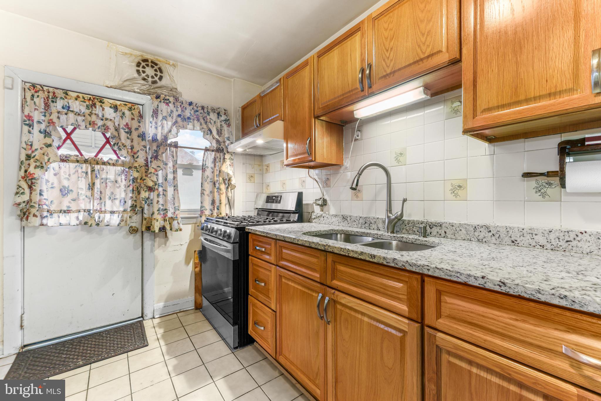 1603 Northgate Road Baltimore, MD 21218 - Photo 10 of 34 Charming kitchen with warm wooden accents.