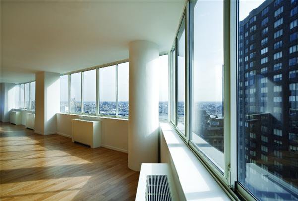 Undisclosed Address Manhattan, NY 10022 - Photo 11 of 14 a large white room with a large window