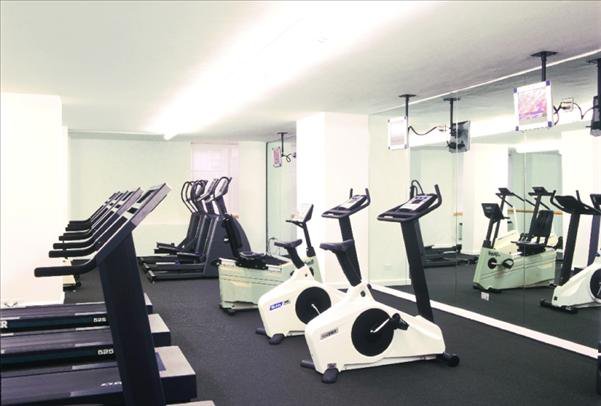 Undisclosed Address Manhattan, NY 10022 - Photo 3 of 14 a view of a room with gym equipment