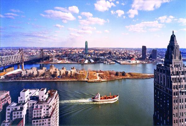 Undisclosed Address Manhattan, NY 10022 - Photo 4 of 14 a view of a city with furniture and a lake view