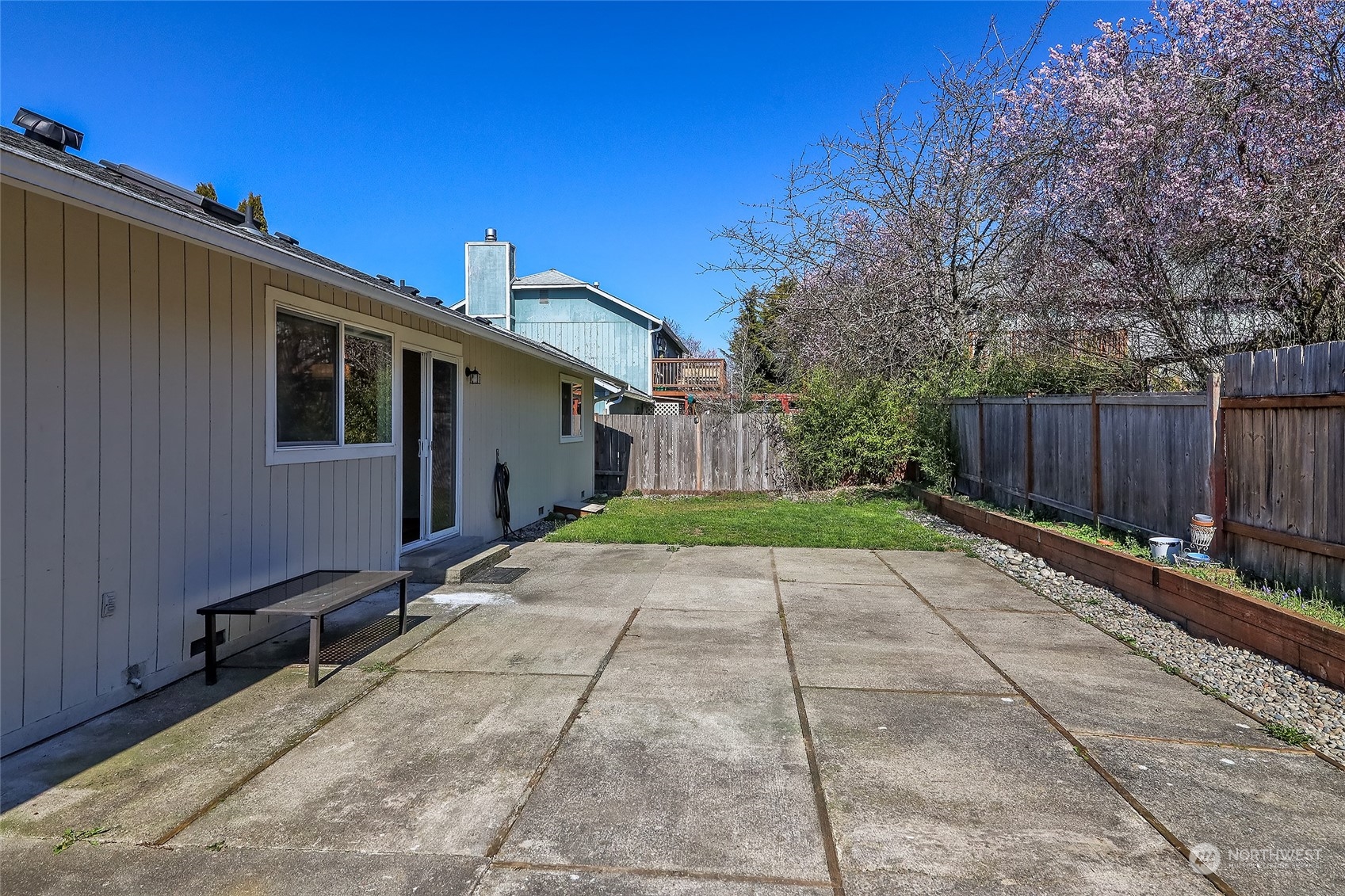 22605 13th Place West Bothell, WA 98021 - Photo 31 of 33 a backyard of a house with yard fire pit and outdoor seating