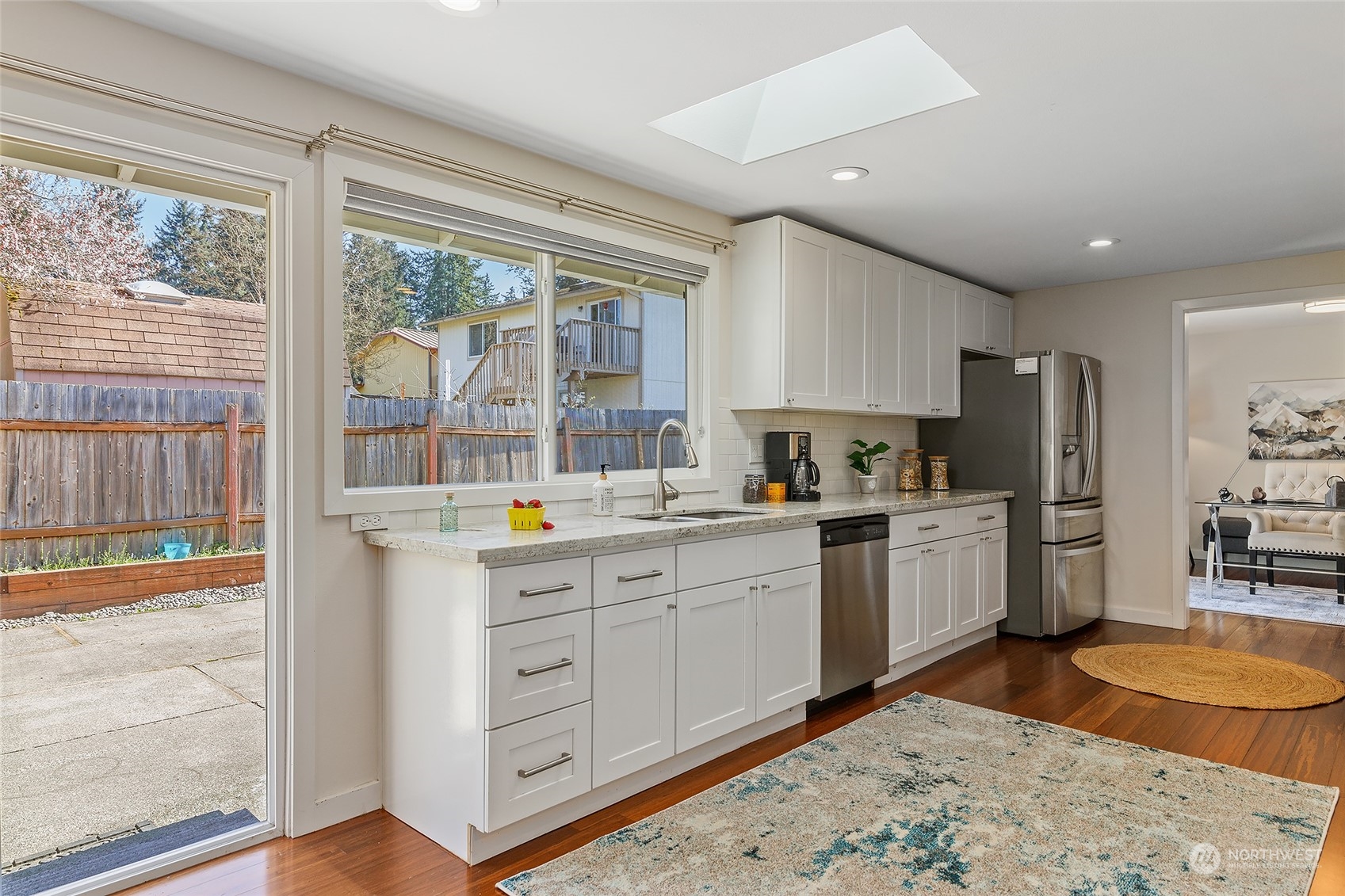 22605 13th Place West Bothell, WA 98021 - Photo 10 of 33 a kitchen with sink refrigerator and window
