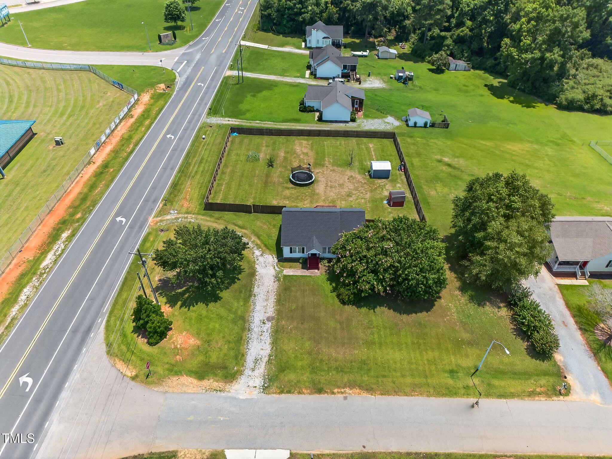 2155 Polenta Road Clayton, NC 27520 - Photo 3 of 39 32-web-or-mls-DJI_20250708133649_0026_D