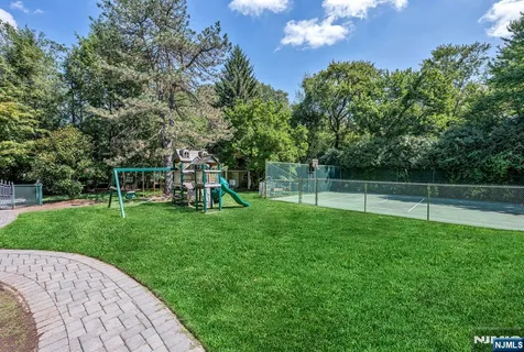 a view of a park with swings