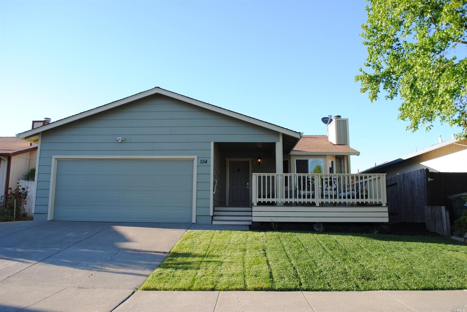 554 Courtyard Circle Santa Rosa, CA 95407 - Photo 1 of 1 a front view of a house with a garden