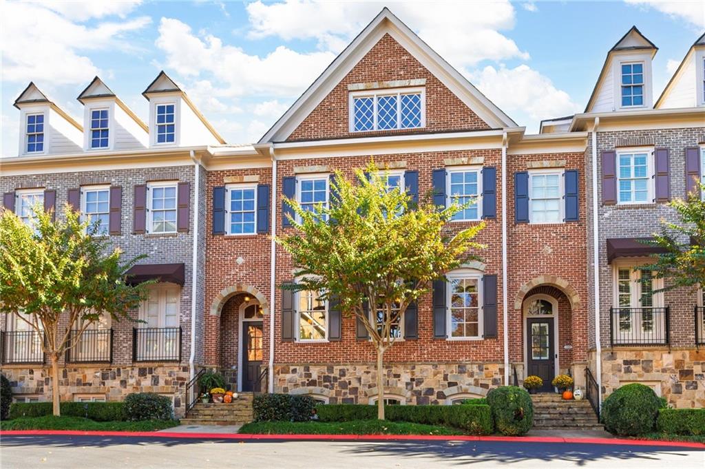 a front view of a multi story residential apartment building