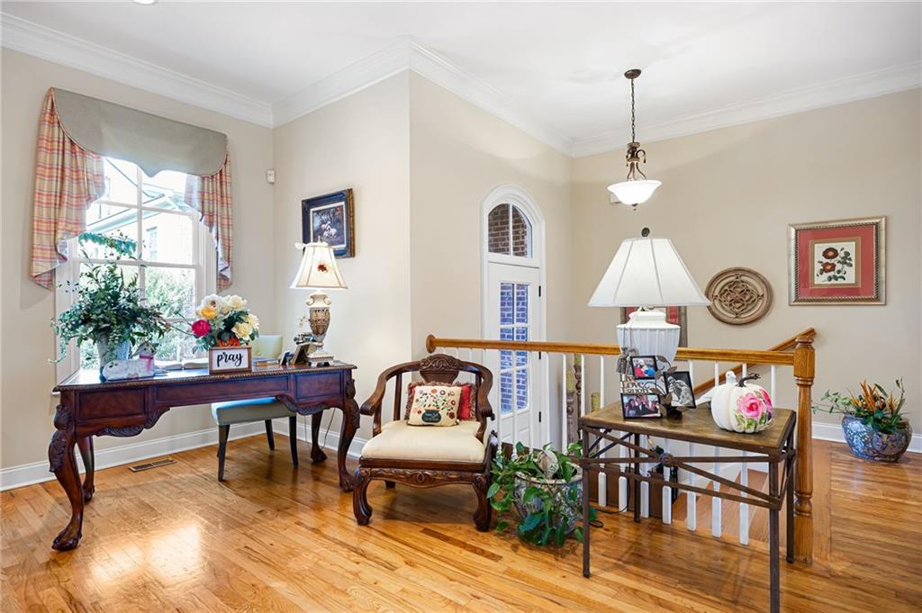 2354 St Davids Square, Unit 3 Kennesaw, GA 30152 - Photo 11 of 39 a living room with furniture and a wooden floor