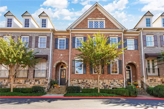 a front view of a multi story residential apartment building