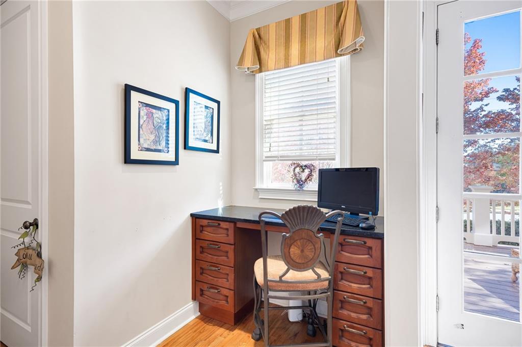 2354 St Davids Square, Unit 3 Kennesaw, GA 30152 - Photo 23 of 39 a view of a workspace with furniture and a window