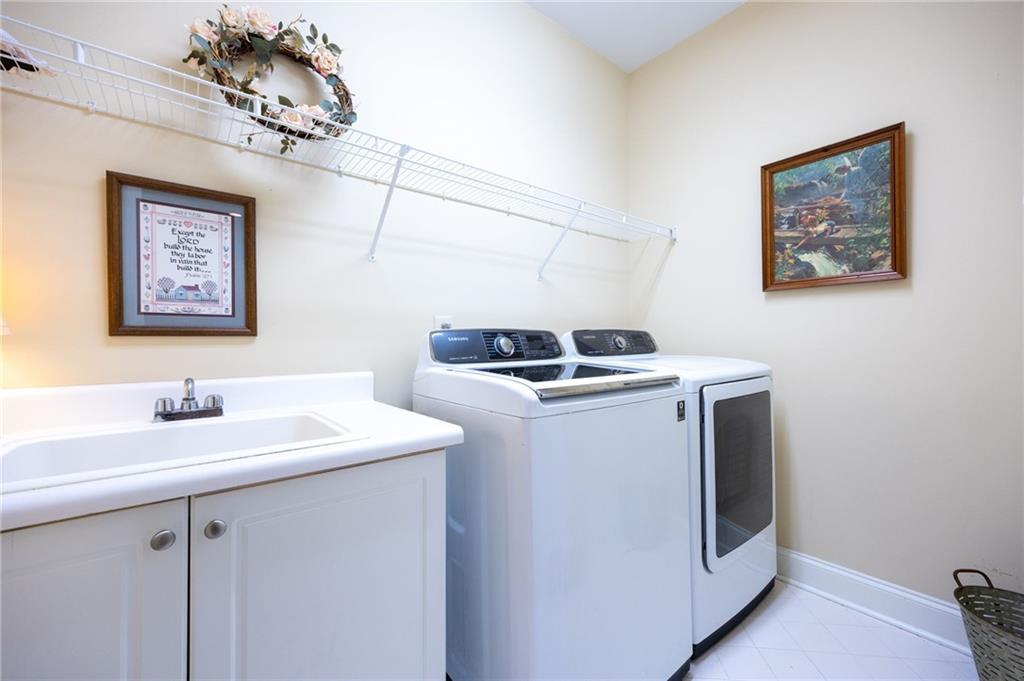 2354 St Davids Square, Unit 3 Kennesaw, GA 30152 - Photo 31 of 39 a utility room with dryer and washer