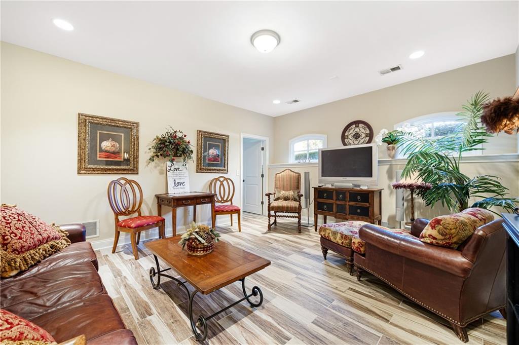 2354 St Davids Square, Unit 3 Kennesaw, GA 30152 - Photo 36 of 39 a living room with fireplace furniture and a large window