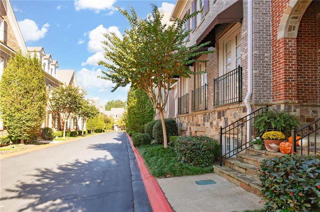 2354 St Davids Square, Unit 3 Kennesaw, GA 30152 - Photo 38 of 39 a view of a street with a building in the background