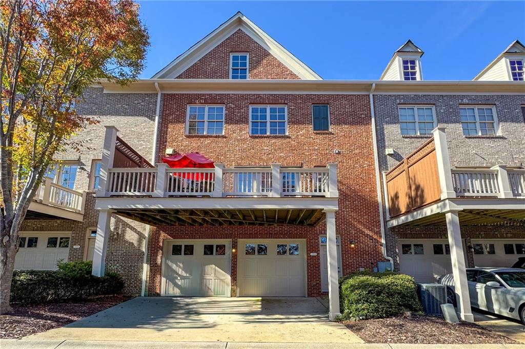 2354 St Davids Square, Unit 3 Kennesaw, GA 30152 - Photo 39 of 39 a front view of a house with garden