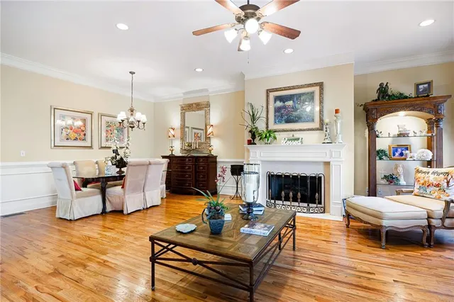 a living room with furniture fireplace and window