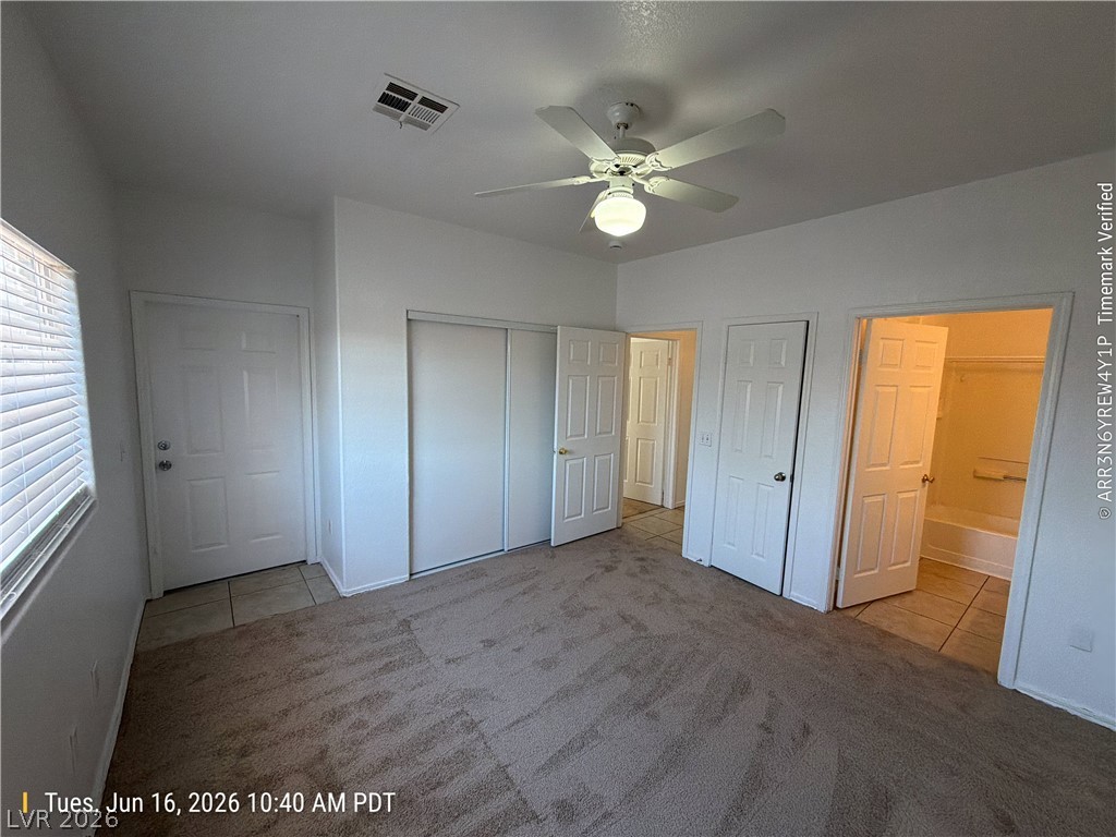 4730 East Craig Road, Unit 1124 Las Vegas, NV 89115 - Photo 15 of 22 A comfortable primary bedroom offers ample closet space and convenient access to a private bath.