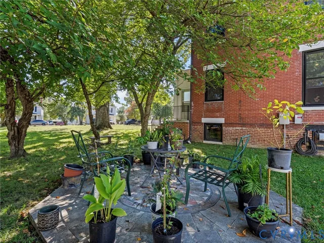 a backyard of a house with lots of green space