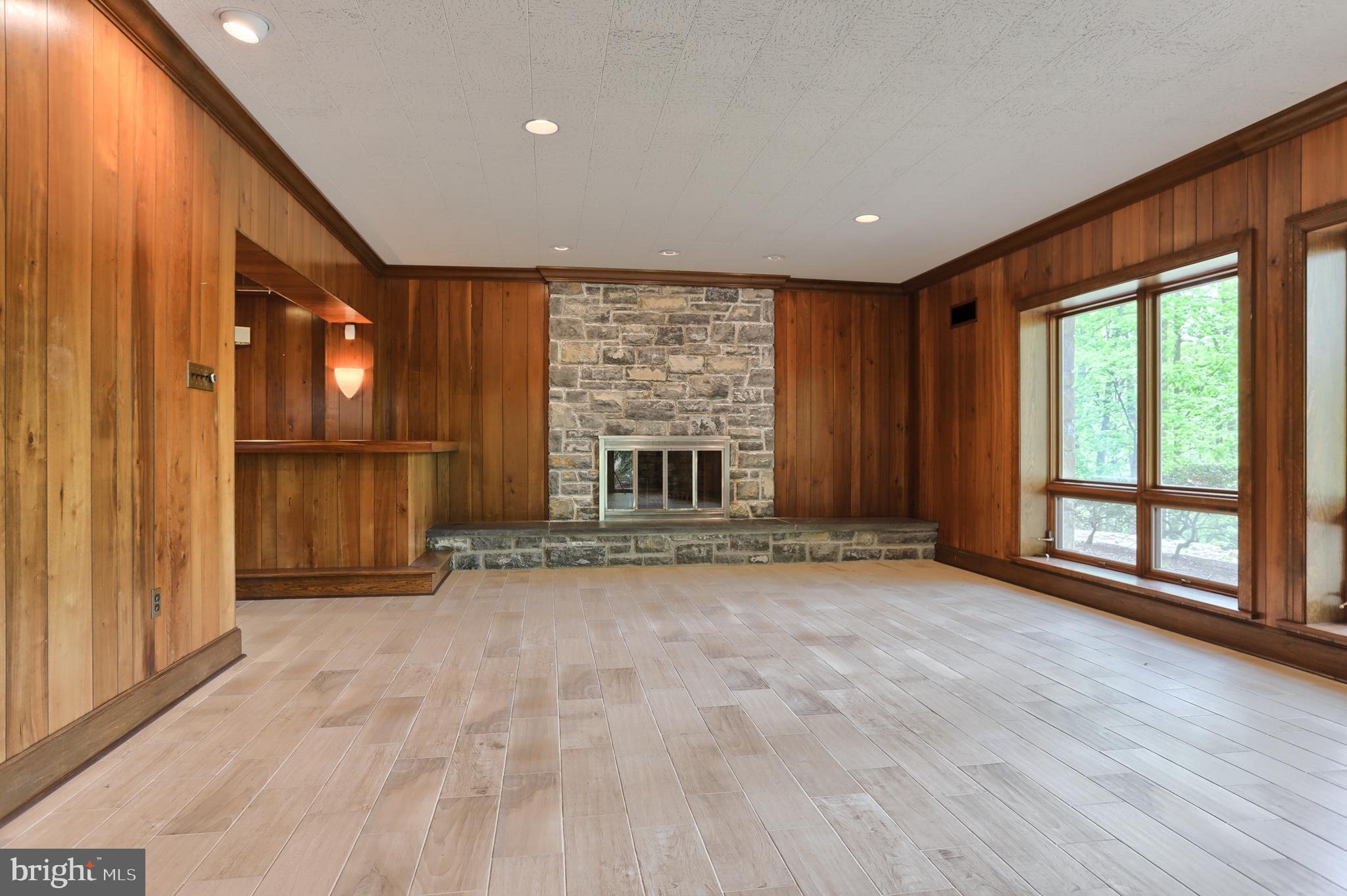 88 Laurel Ridge Road Hershey, PA 17033 - Photo 21 of 44 Family Room with wet bar and stone fireplace