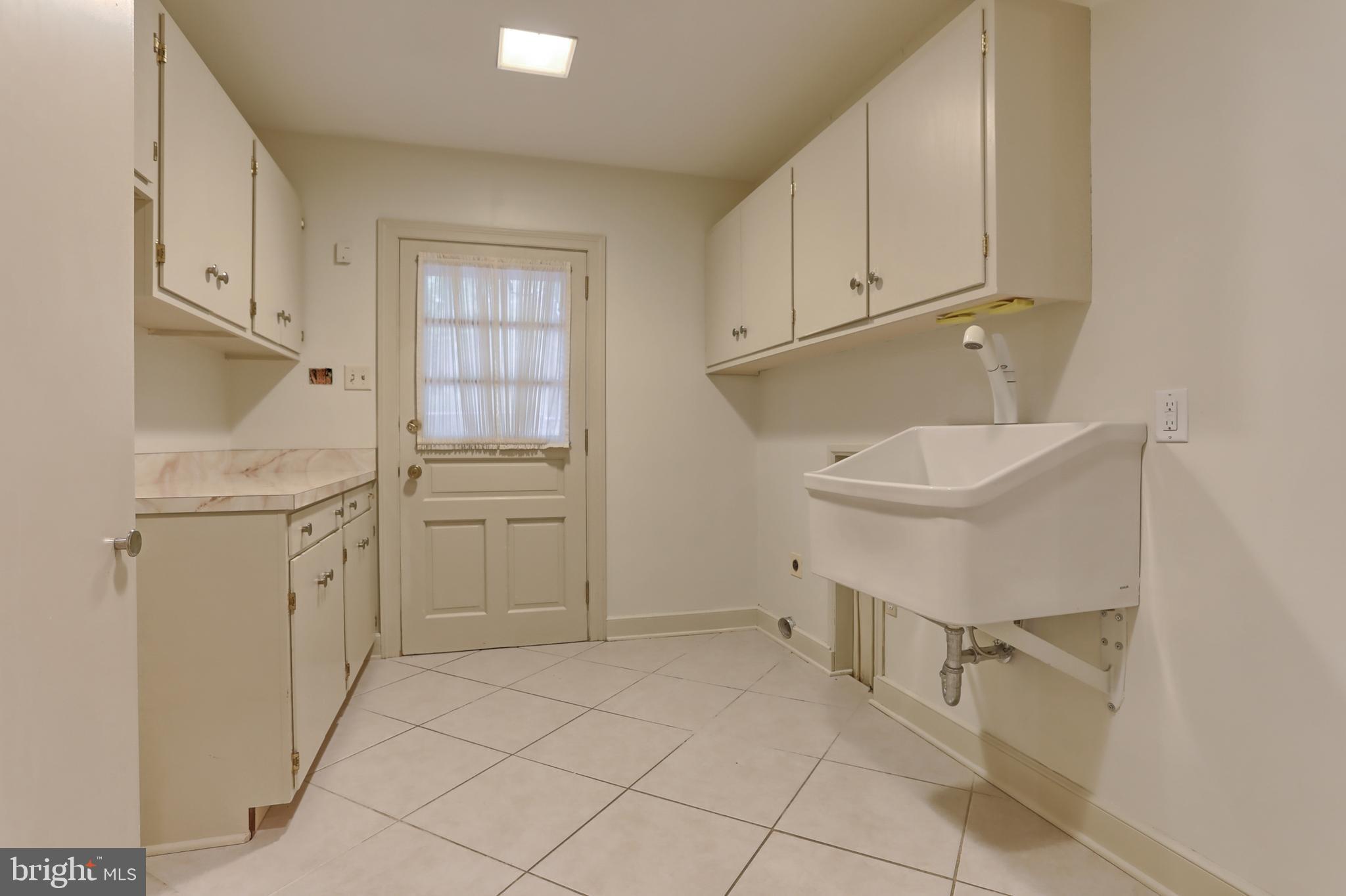 88 Laurel Ridge Road Hershey, PA 17033 - Photo 34 of 44 Large laundry room with cabinets