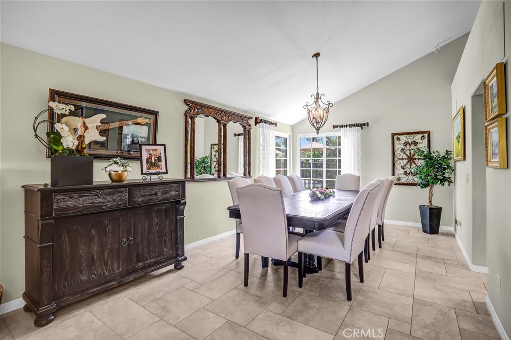 5787 Ridgeway Road Rancho Cucamonga, CA 91701 - Photo 13 of 56 a view of a dining room with furniture window and outside view