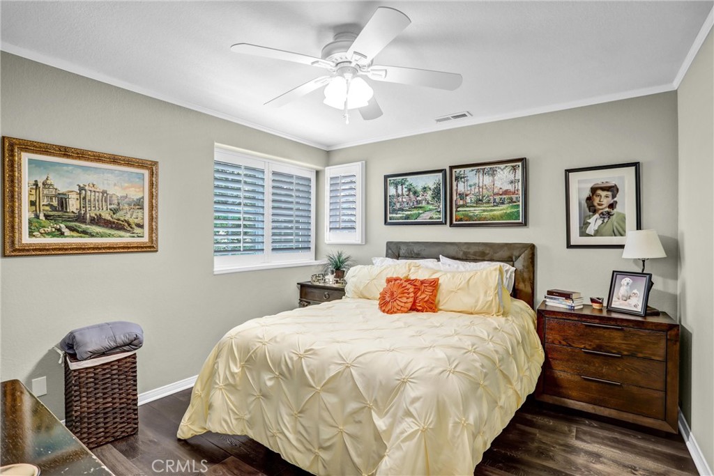 5787 Ridgeway Road Rancho Cucamonga, CA 91701 - Photo 33 of 56 a bedroom with a large bed and a window