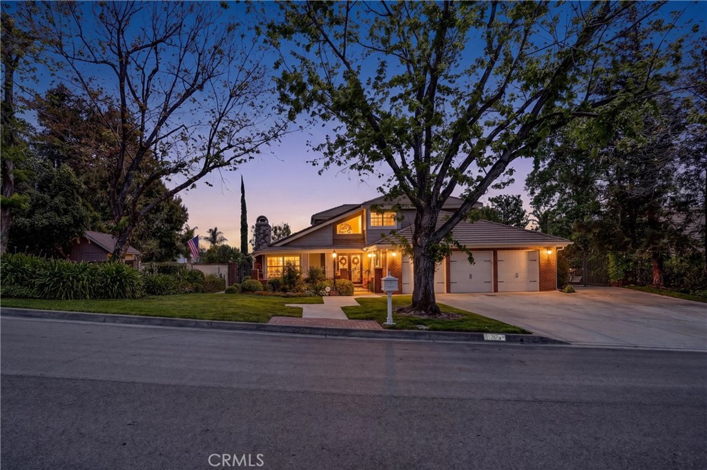 5787 Ridgeway Road Rancho Cucamonga, CA 91701 - Photo 7 of 56 a front view of house with yard and green space