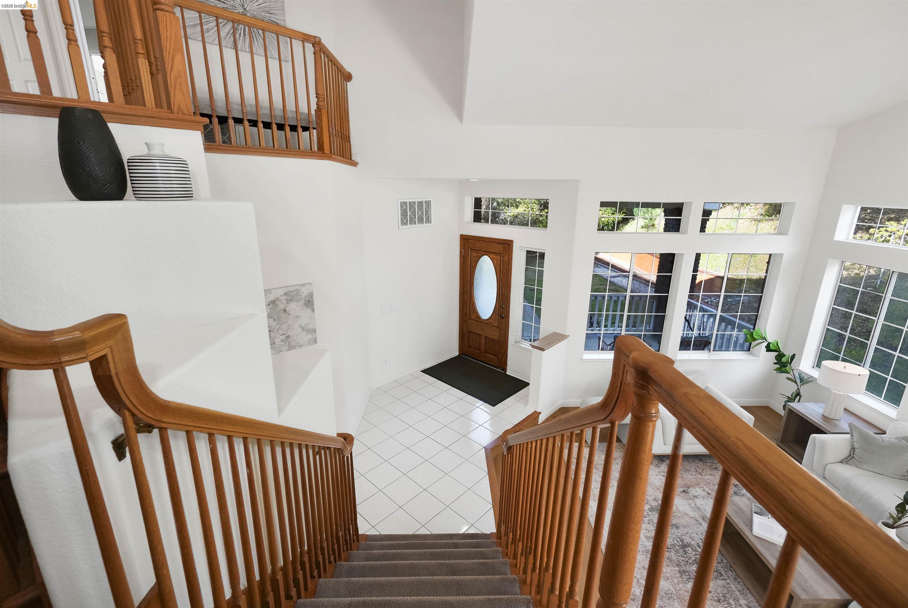 4080 Woodstock Road Hayward, CA 94542 - Photo 16 of 52 a view of entryway and hall with wooden floor