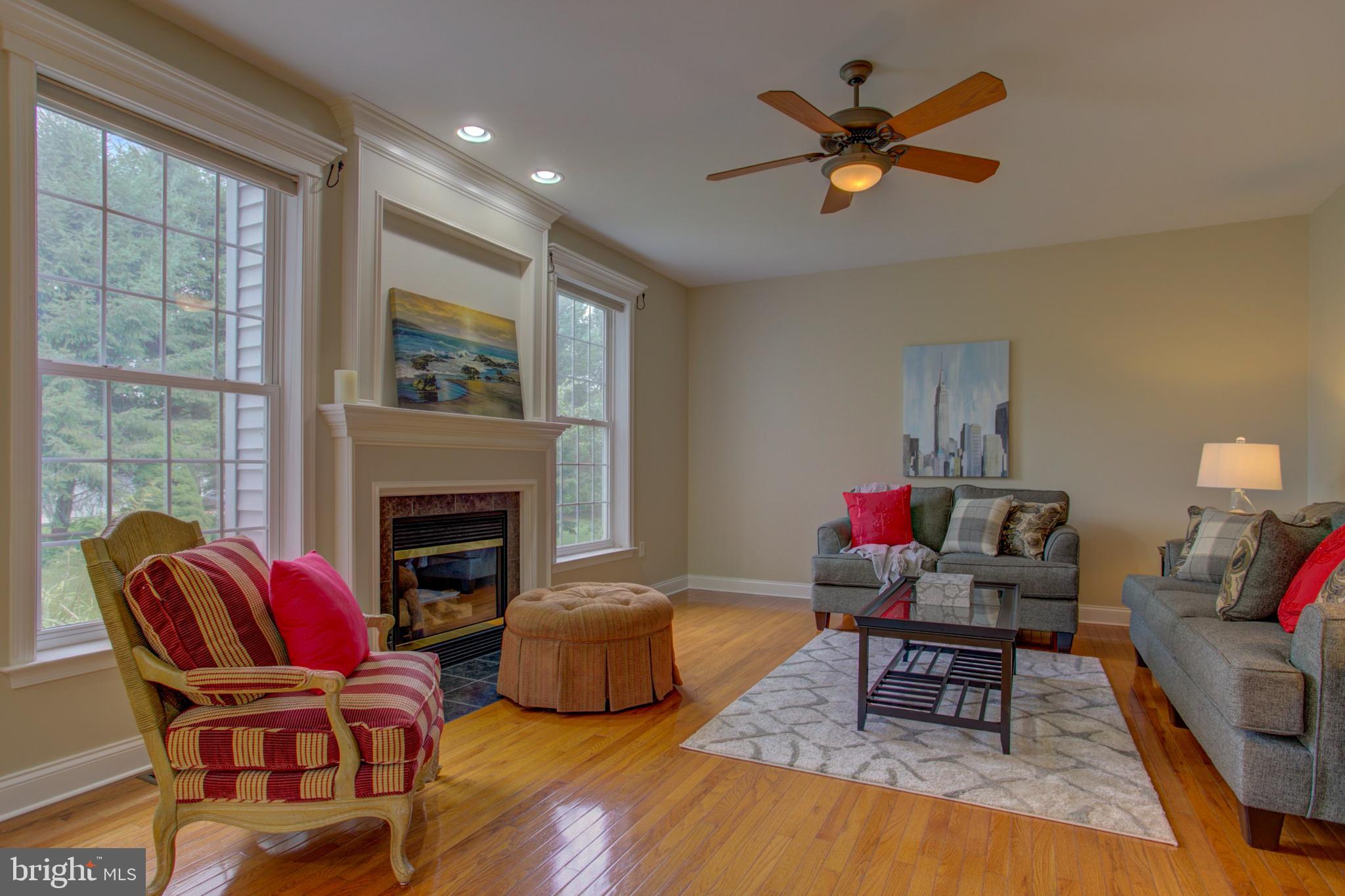 324 Bloomfield Drive Lititz, PA 17543 - Photo 3 of 27 Family room with fireplace