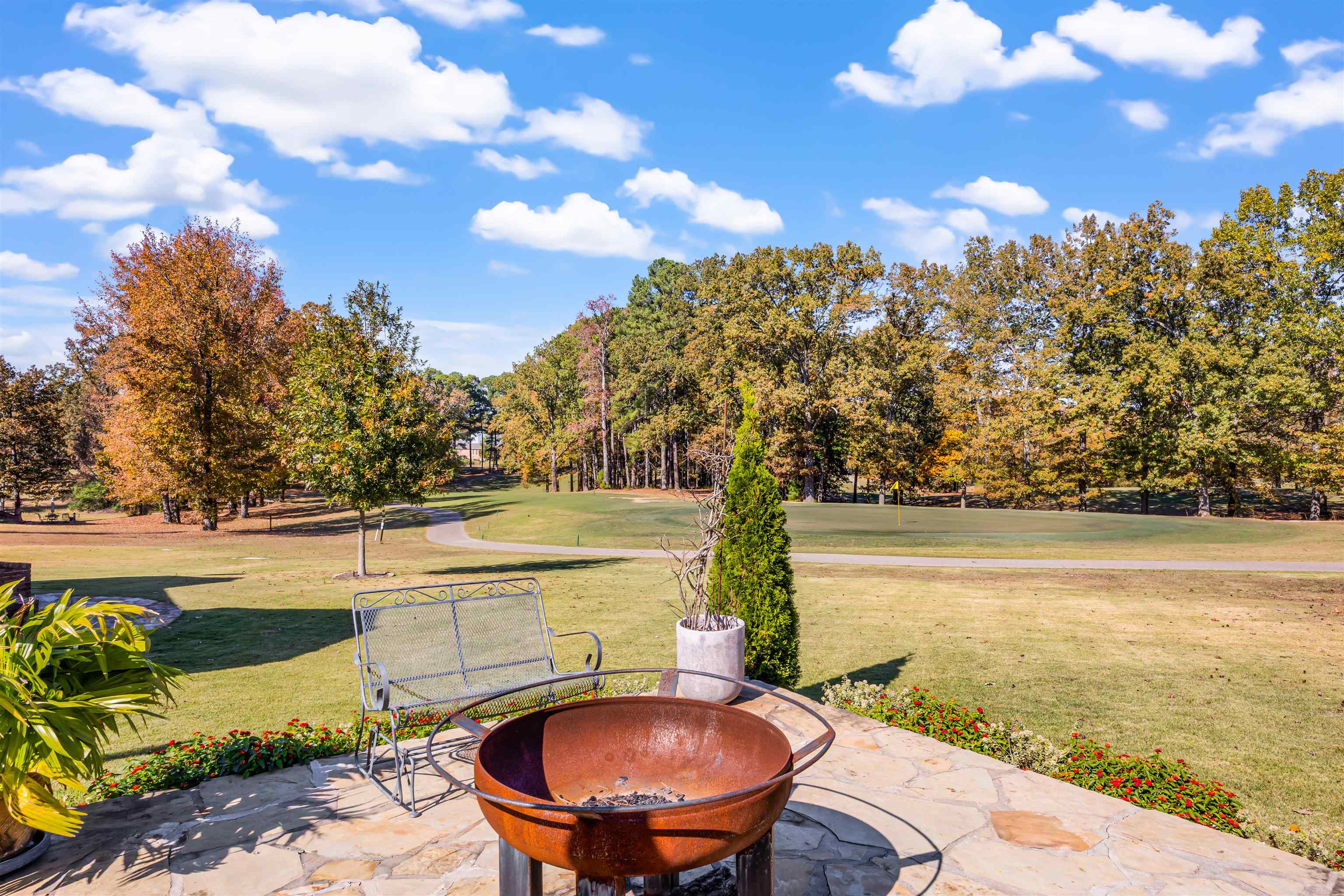 140 Legends Drive Counce, TN 38326 - Photo 26 of 30 View of patio / terrace featuring a fire pit, view of scattered trees, and view of golf course