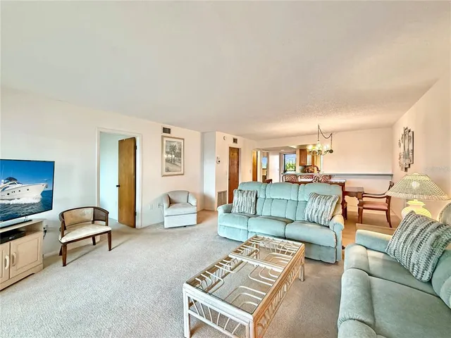 a living room with furniture and a couch